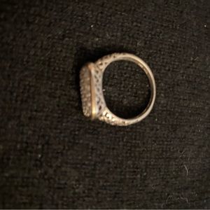 Sterling silver with 14k gold edge and tiny diamonds